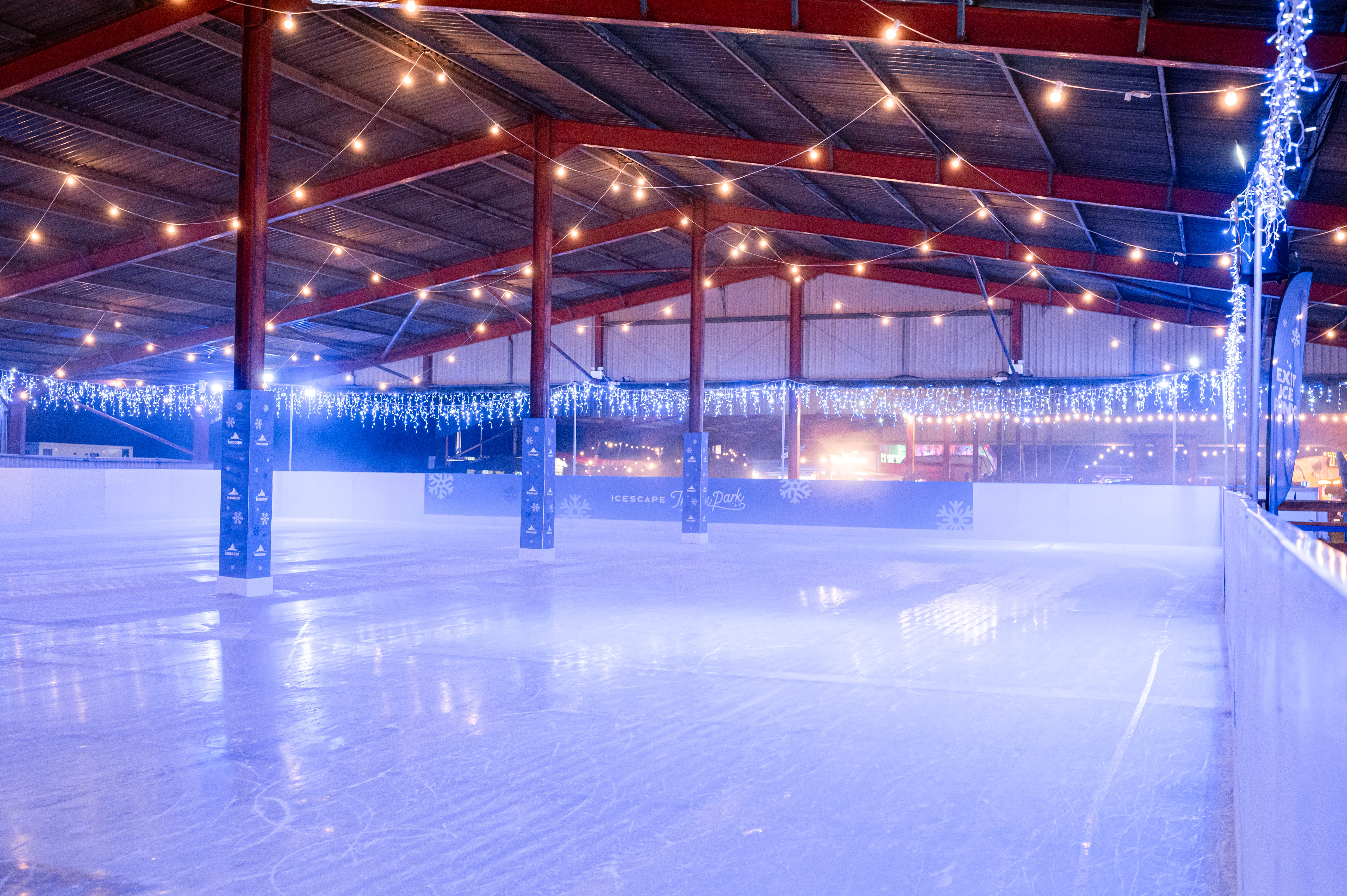 A temporary real ice rink. The ice pad is set up inside a barn. 