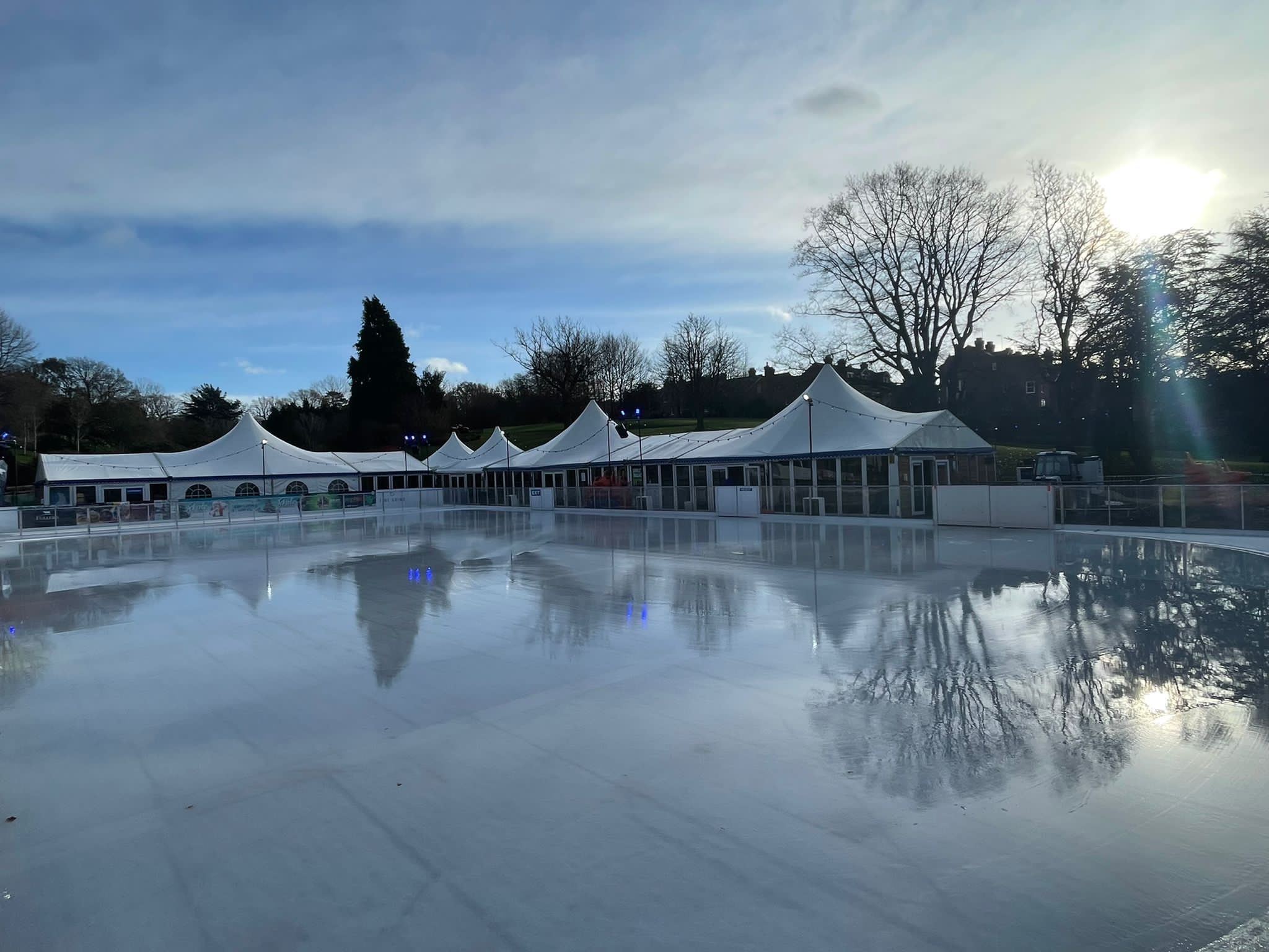 The sun shining on Royal Tunbridge Wells empty winter ice rink.