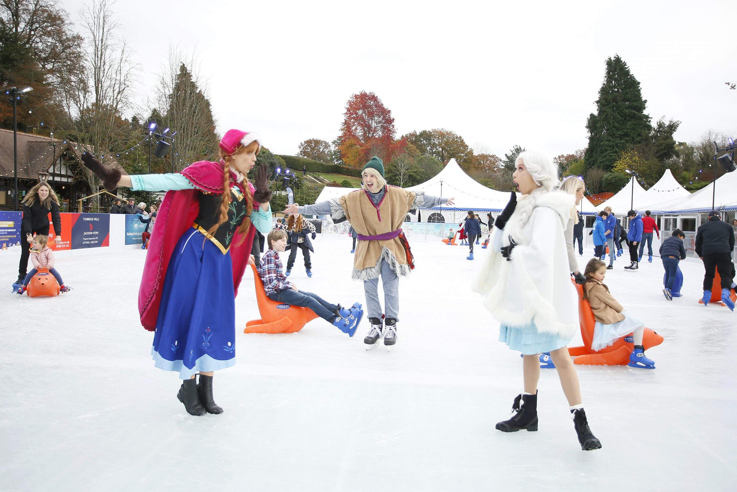 3 characters from the film Frozen pose for a photo on Royal Tunbridge Wells Ice Rink