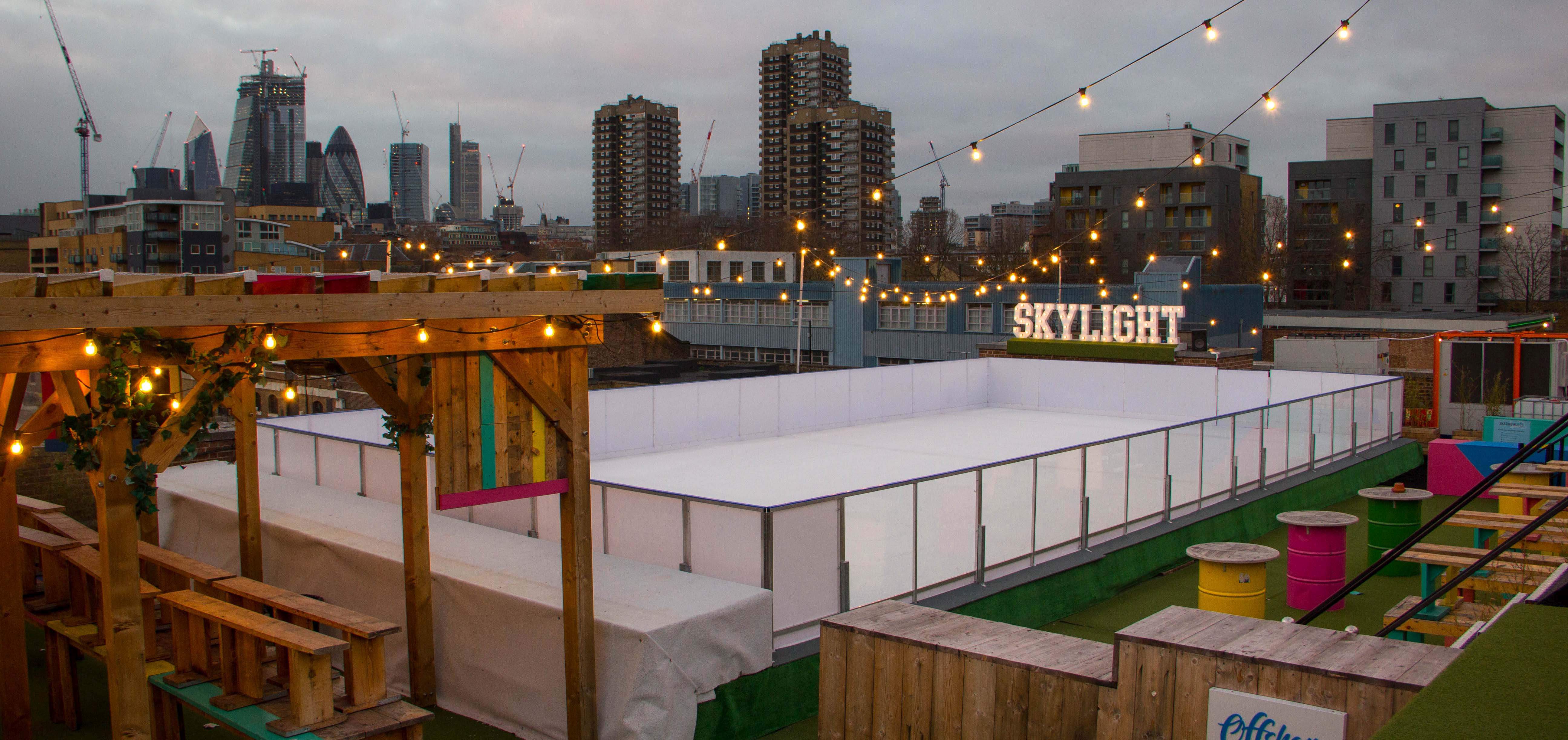 Tobacco Docks winter Ice rink. A real ice rink at Skylight on top of Tobacco Docks which looks over London. 